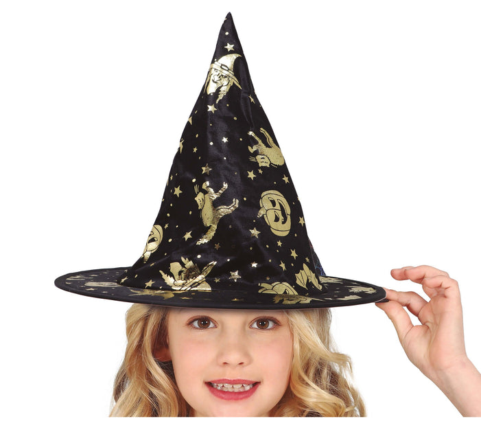 Musta kultainen noitahattu lapsi