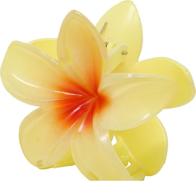 Bloem Haarclip Geel van Fiestas Guirca koop je bij Partywinkel