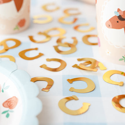 Kultainen konfetti hevosenkengät