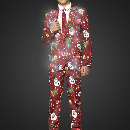 Punainen puku joulu valo lapsen kanssa