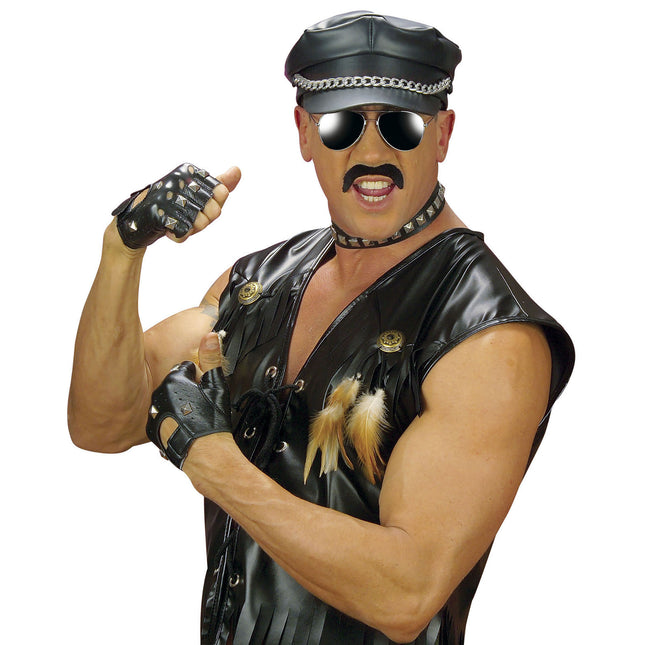 Käsineet, joissa on piikkejä