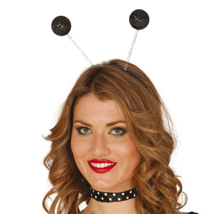 Haarband Bollen Zwarte Glitter van Fiestas Guirca koop je bij Partywinkel