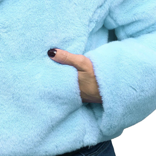 Jasje Fluffy rave lichtblauw (M/L) van Boland koop je bij Partywinkel