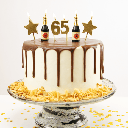 Kaarsjes 65 Jaar Champagne 17,5cm van Paper Dreams koop je bij Partywinkel