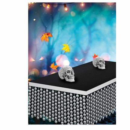 Witte Halloween Tafelrok Doodshoofden 4m van Fiestas Guirca koop je bij Partywinkel
