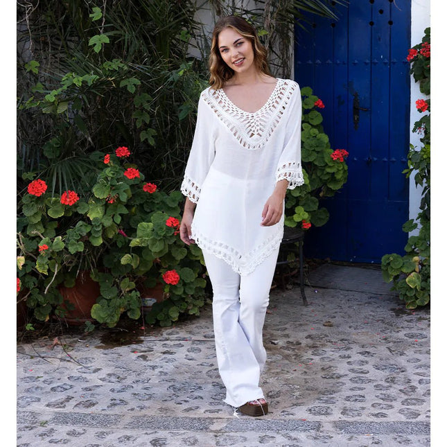 Witte Poncho Dames Salinas van Boland koop je bij Partywinkel